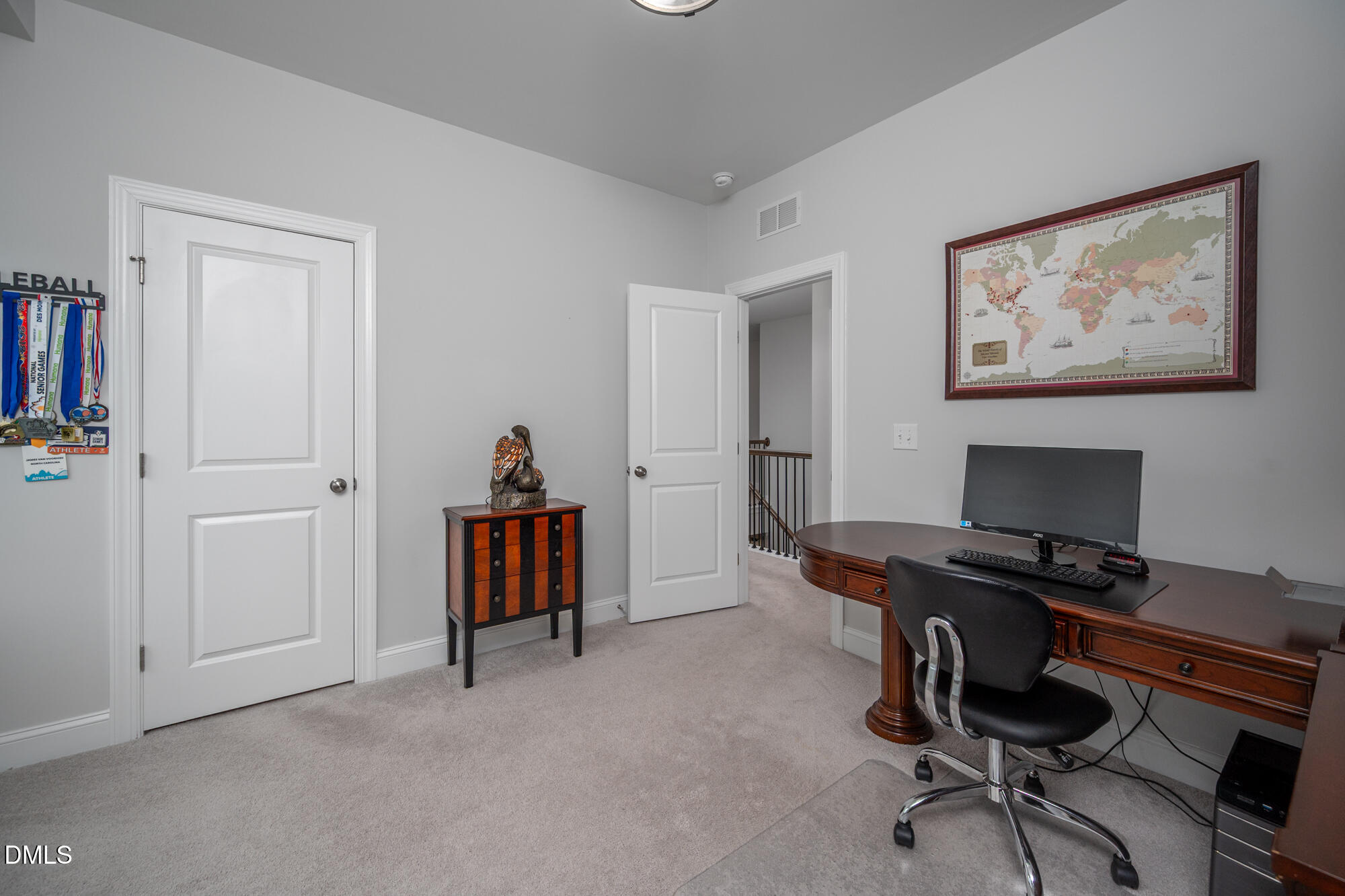319 High Woods Ridge Chapel Hill, NC 27517 - Photo 36 of 71 a view of a workspace with furniture and a cabinet