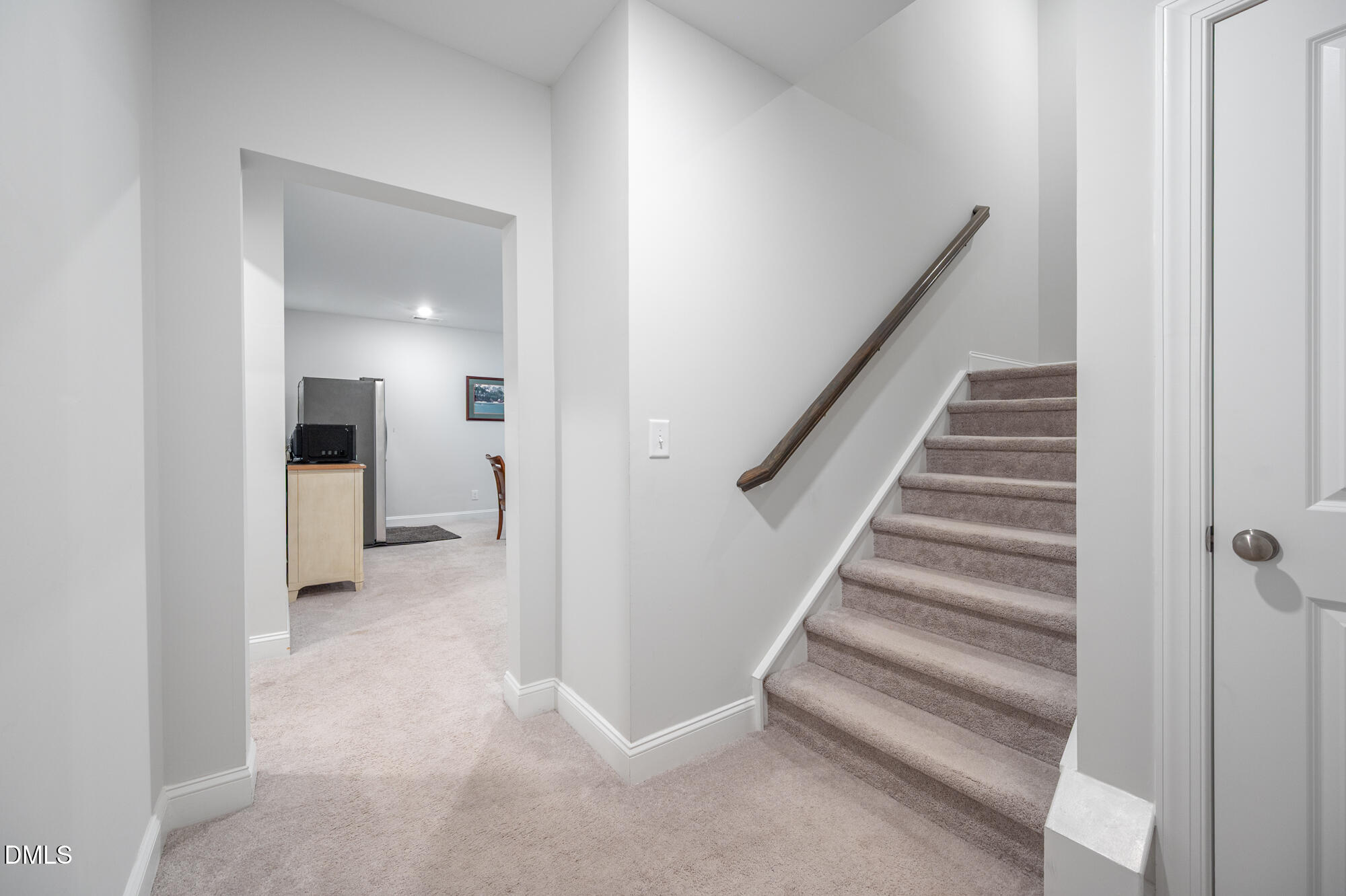 319 High Woods Ridge Chapel Hill, NC 27517 - Photo 38 of 71 a view of a hallway with staircase and white walls