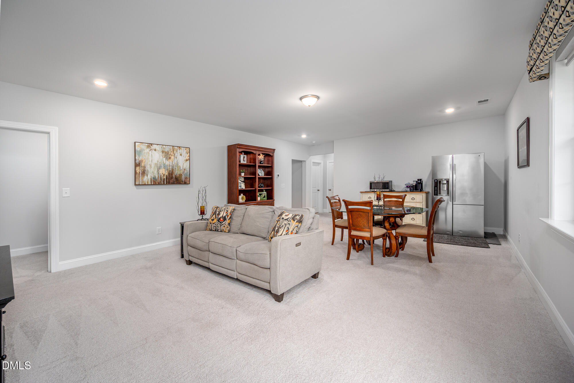 319 High Woods Ridge Chapel Hill, NC 27517 - Photo 40 of 71 a living room with furniture and a table