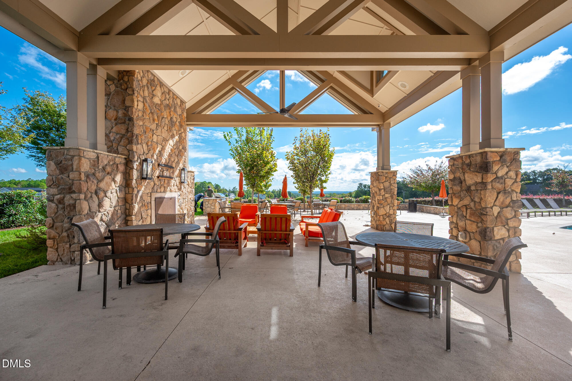 319 High Woods Ridge Chapel Hill, NC 27517 - Photo 60 of 71 a view of a patio with table and chairs and potted plants
