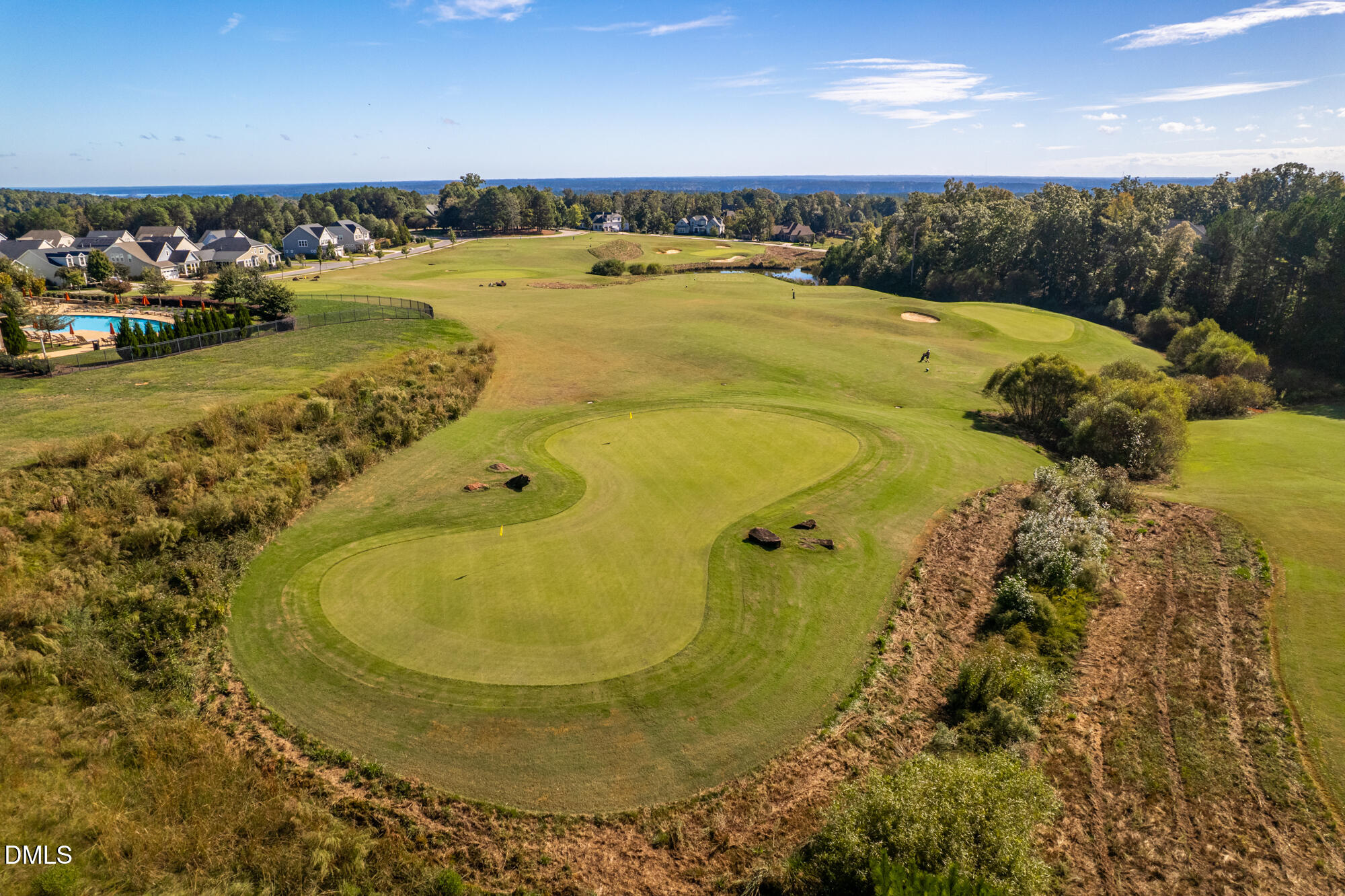 319 High Woods Ridge Chapel Hill, NC 27517 - Photo 66 of 71 a view of a swimming pool with outdoor seating and yard in back