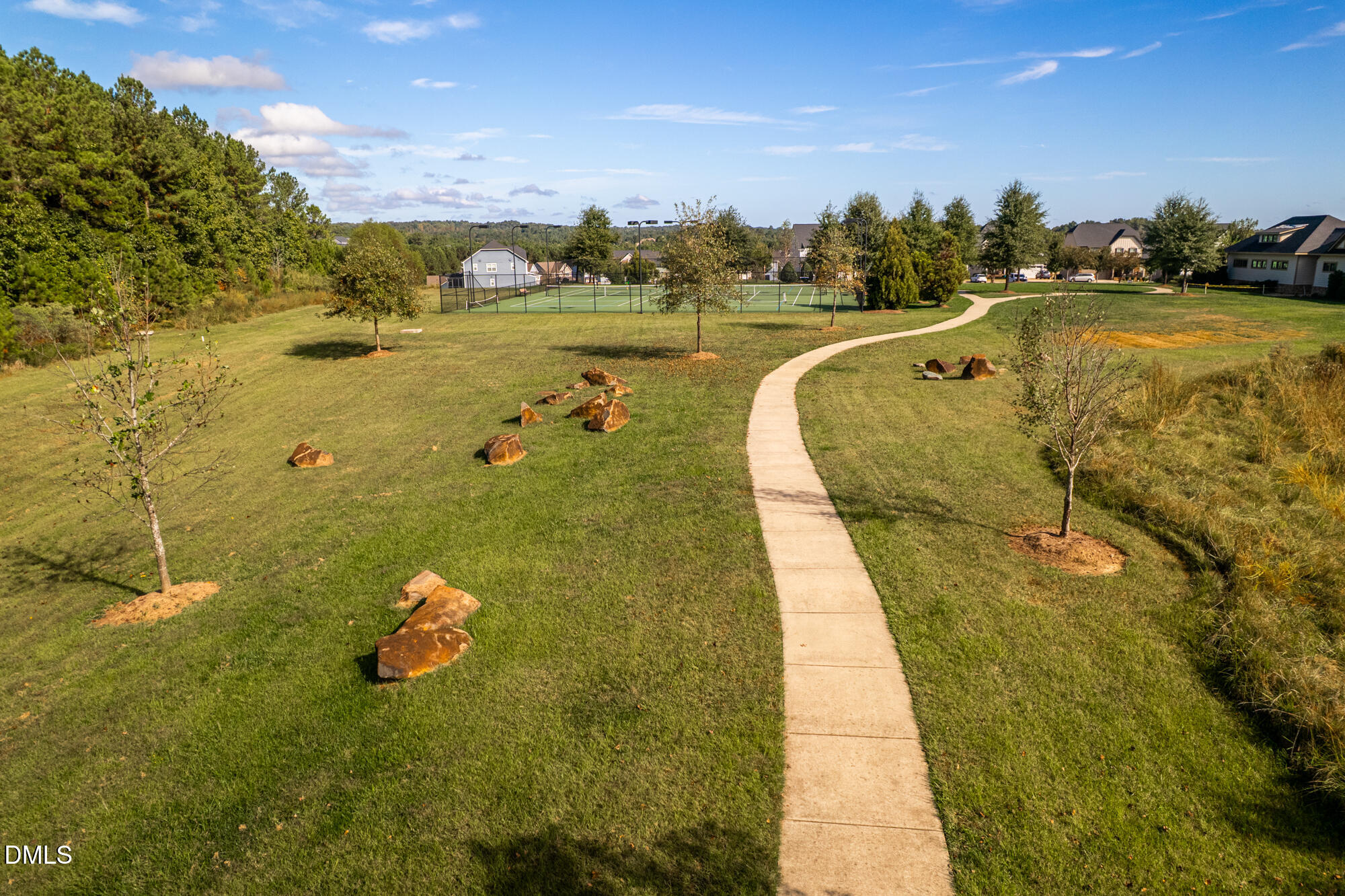 319 High Woods Ridge Chapel Hill, NC 27517 - Photo 70 of 71 a view of a lake with a outdoor space