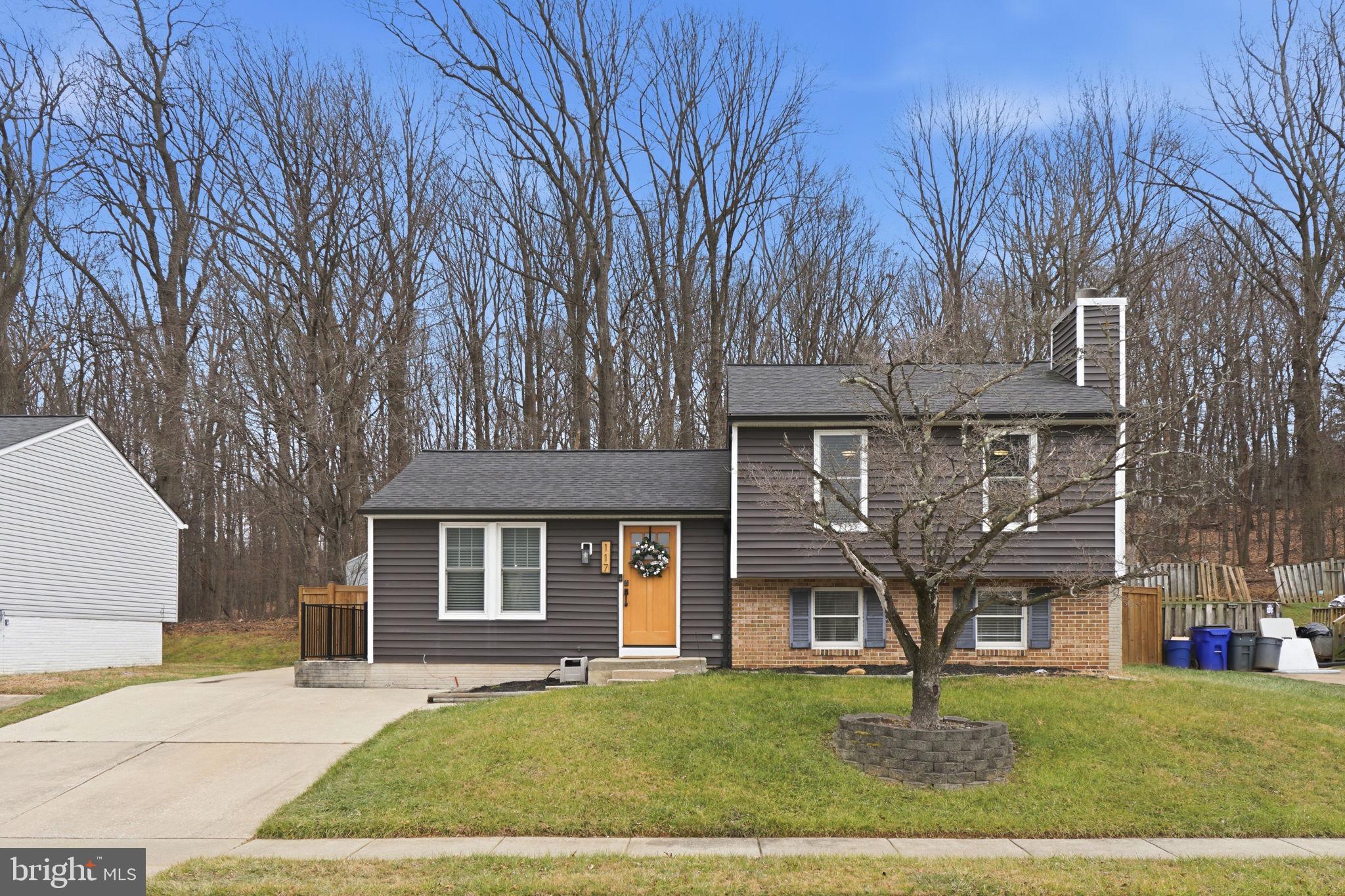 front view of a house with a yard