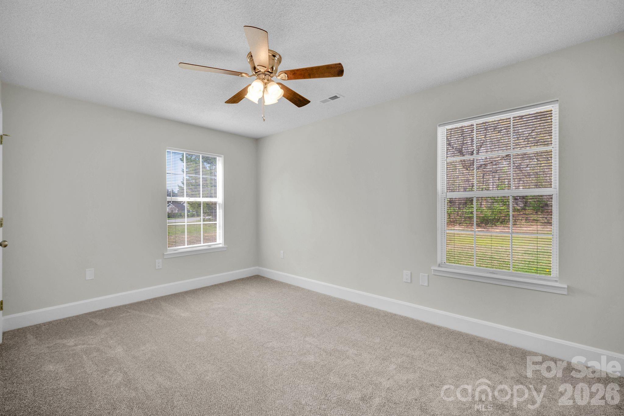 2720 Goldmine Road Monroe, NC 28110 - Photo 21 of 31 a view of an empty room with a window
