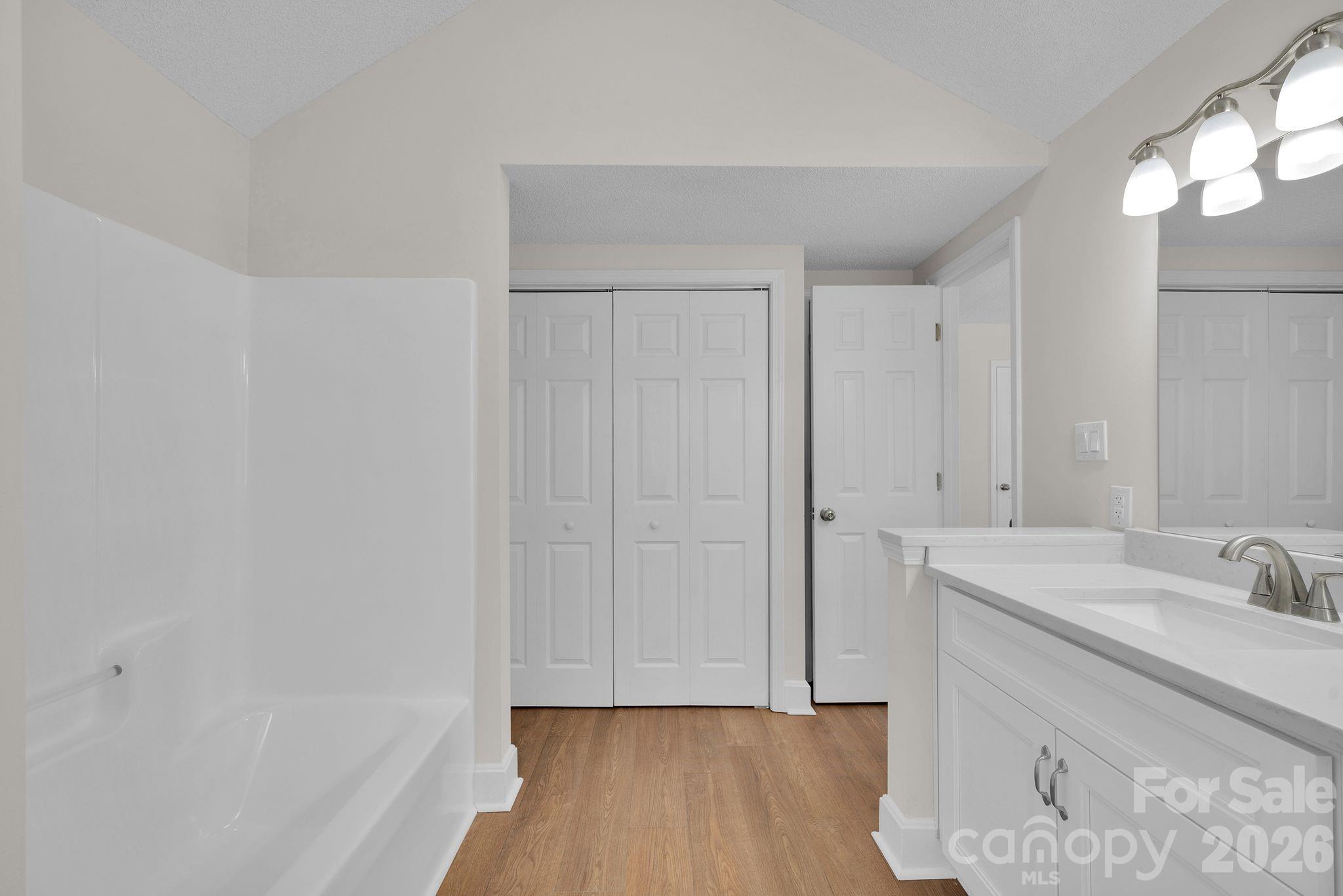 2720 Goldmine Road Monroe, NC 28110 - Photo 25 of 31 a bathroom with a sink and a tub