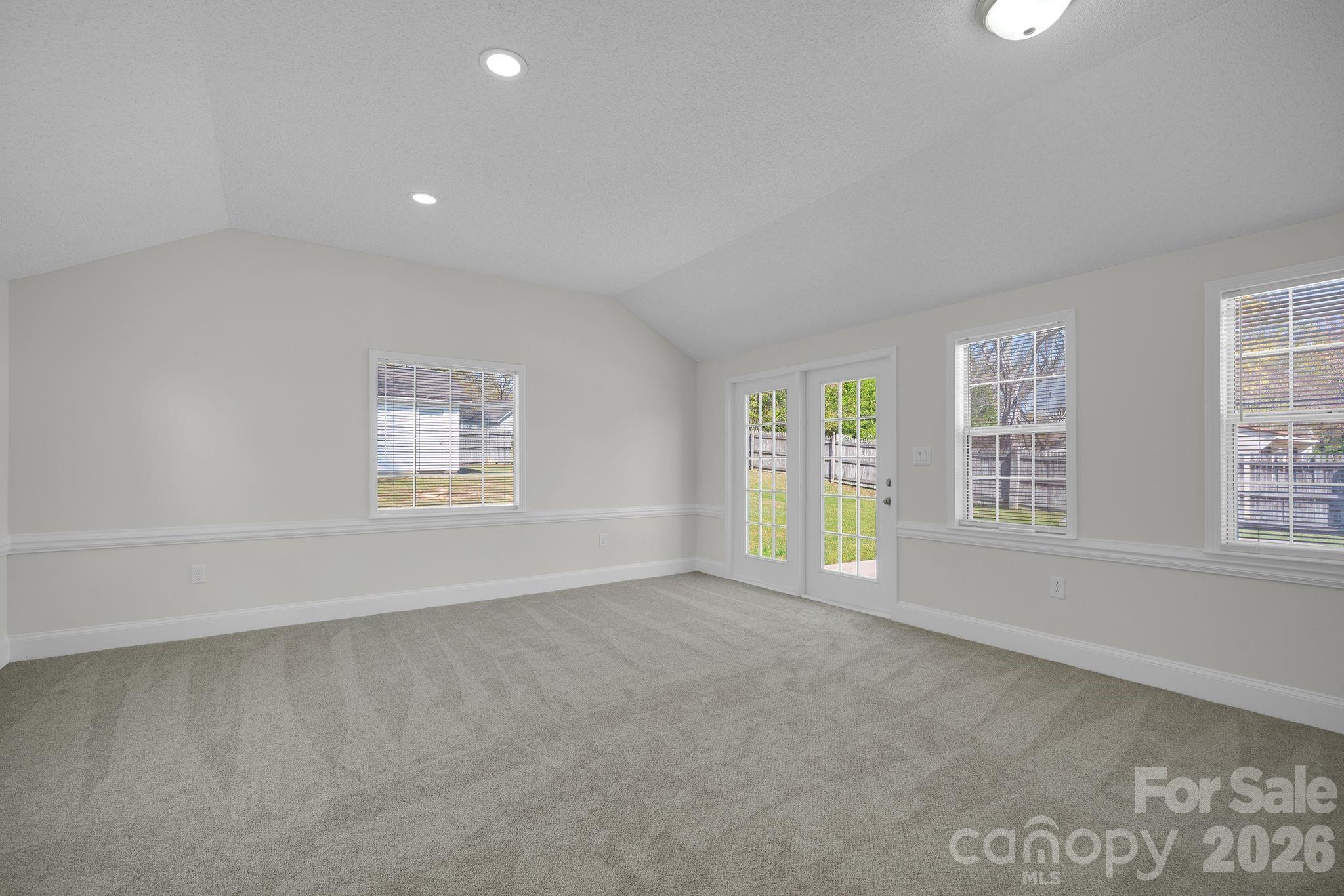 2720 Goldmine Road Monroe, NC 28110 - Photo 26 of 31 an empty room with windows