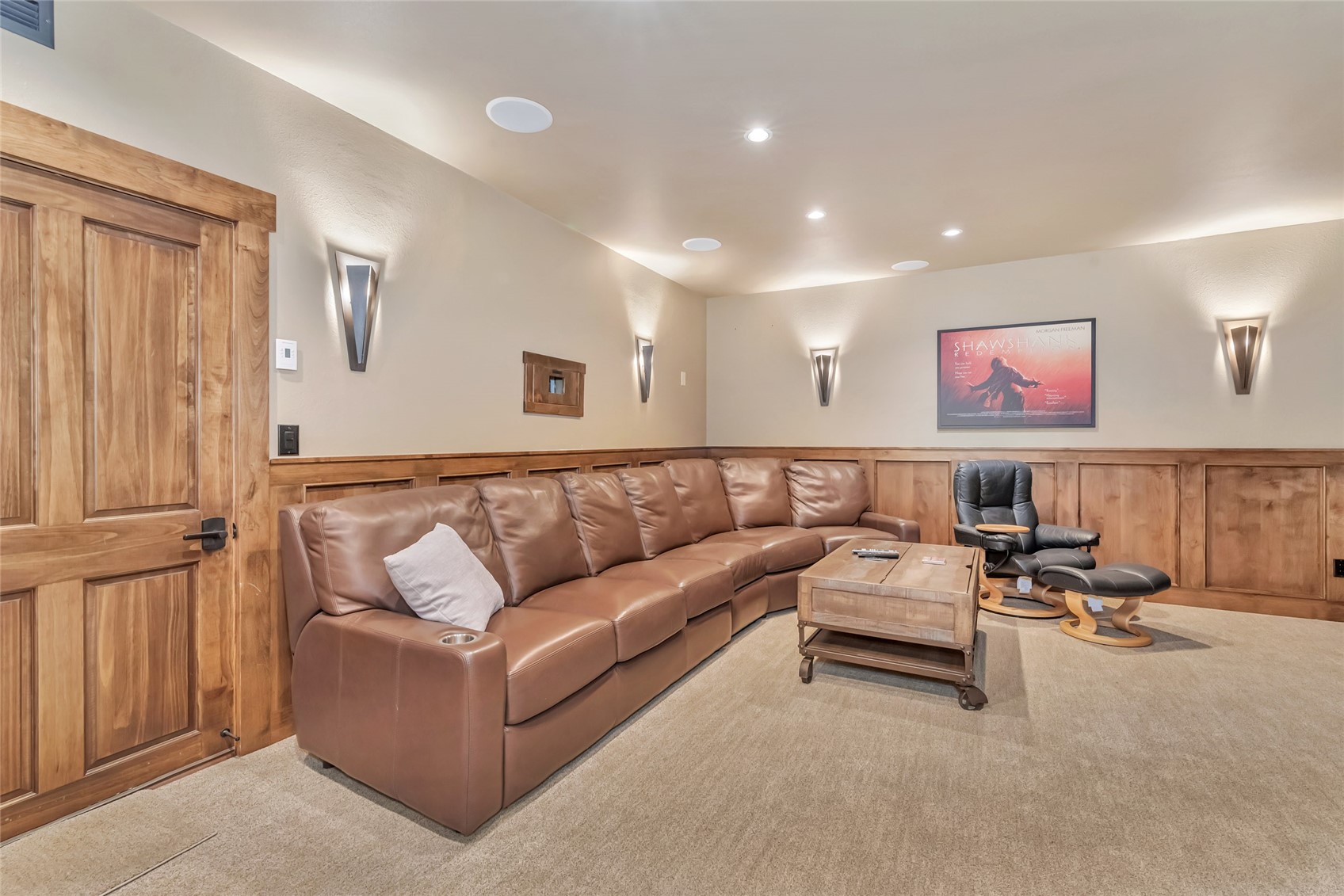 31485 Deerwood Ranch Road Steamboat Springs, CO 80487 - Photo 44 of 49 a living room with furniture and wall paintings