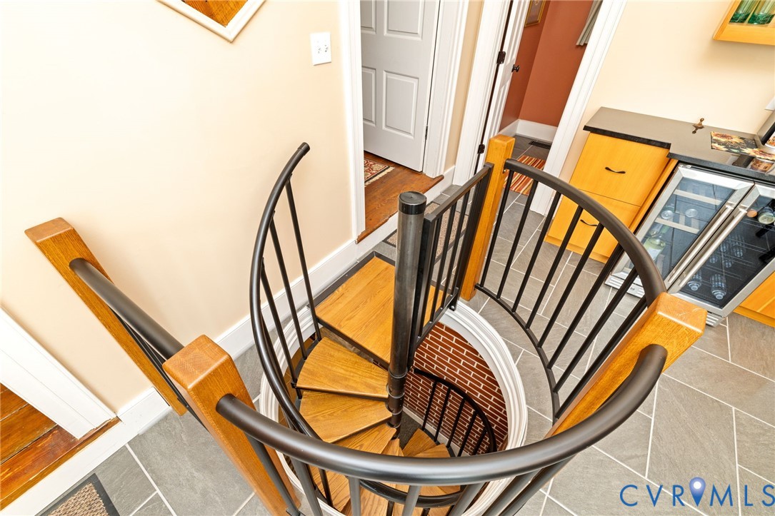 2284 Wallace's Bridge Road Lunenburg, VA 23952 - Photo 35 of 89 Spiral staircase with wood treads and metal railin