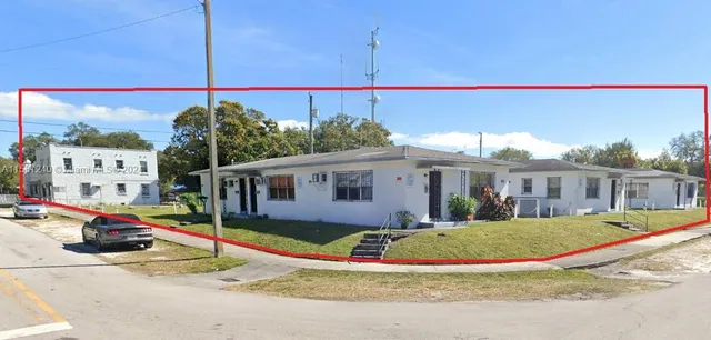 a view of a house with a park