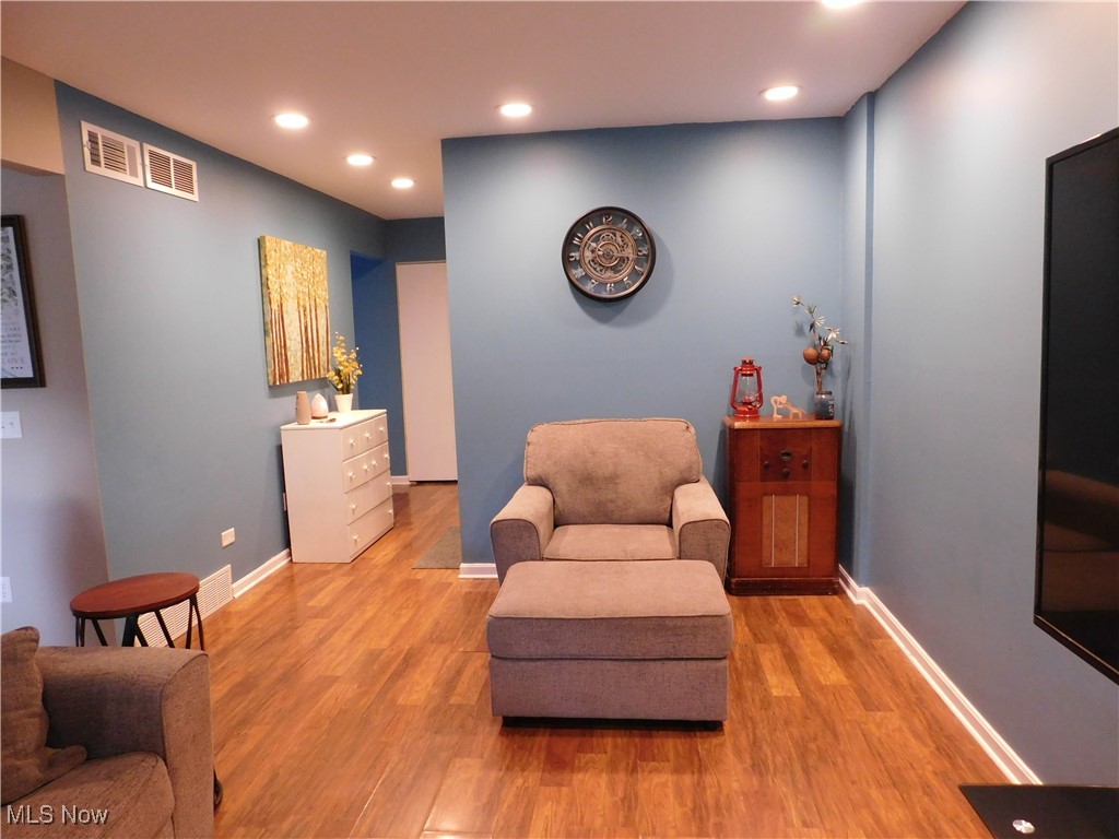987 Hampton Ridge Drive Akron, OH 44313 - Photo 23 of 49 Wood like finished floors and recessed lighting
