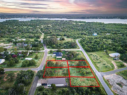 a view of yard with swimming pool and outdoor seating