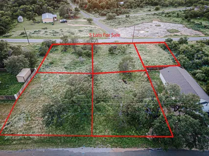 a view of small space and front view of a house