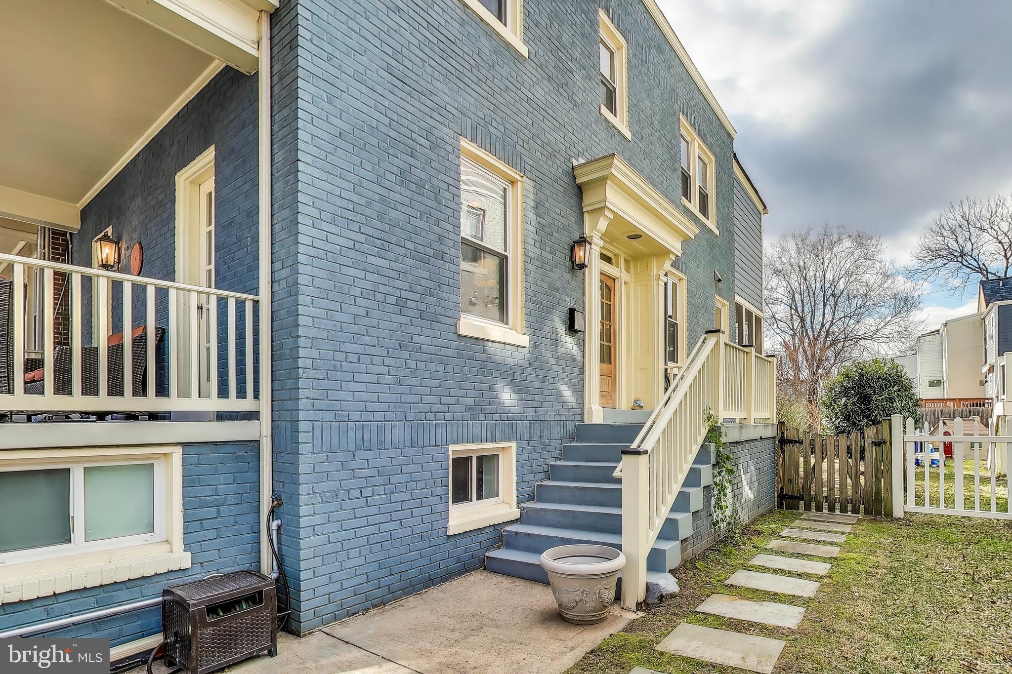 5708 4th Street Northwest Washington, DC 20011 - Photo 2 of 53 a view of a brick house with many windows