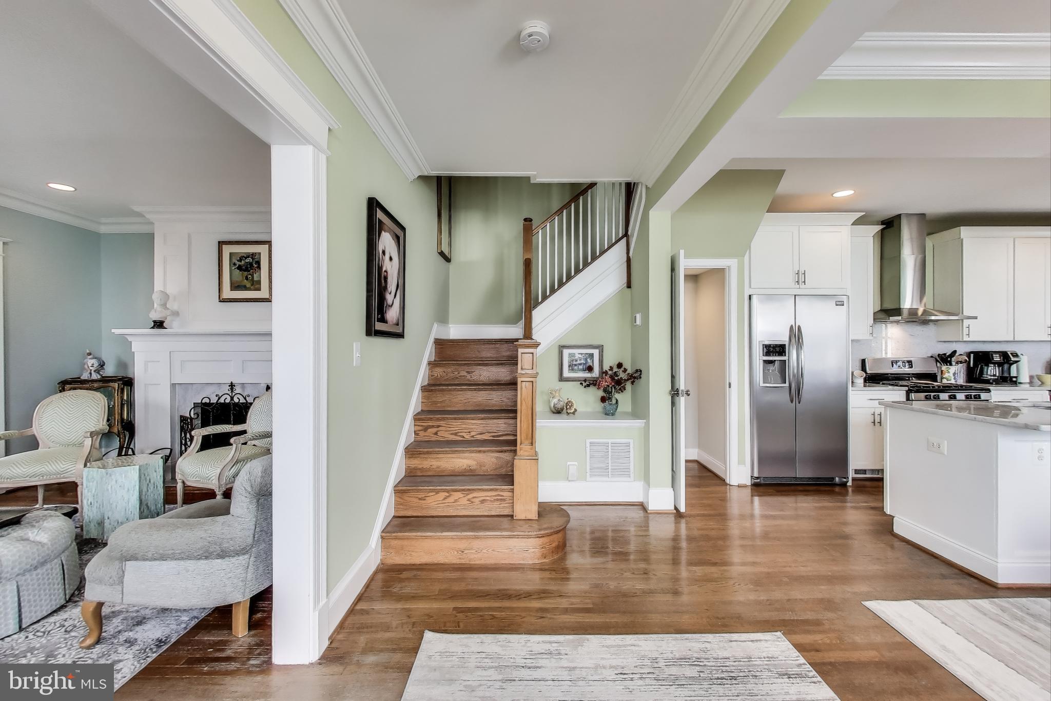 5708 4th Street Northwest Washington, DC 20011 - Photo 5 of 53 a view of a kitchen with furniture and wooden floor
