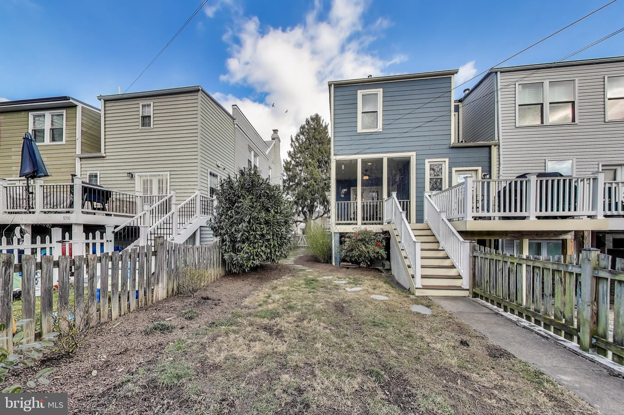 5708 4th Street Northwest Washington, DC 20011 - Photo 52 of 53 a view of a house with wooden deck and furniture