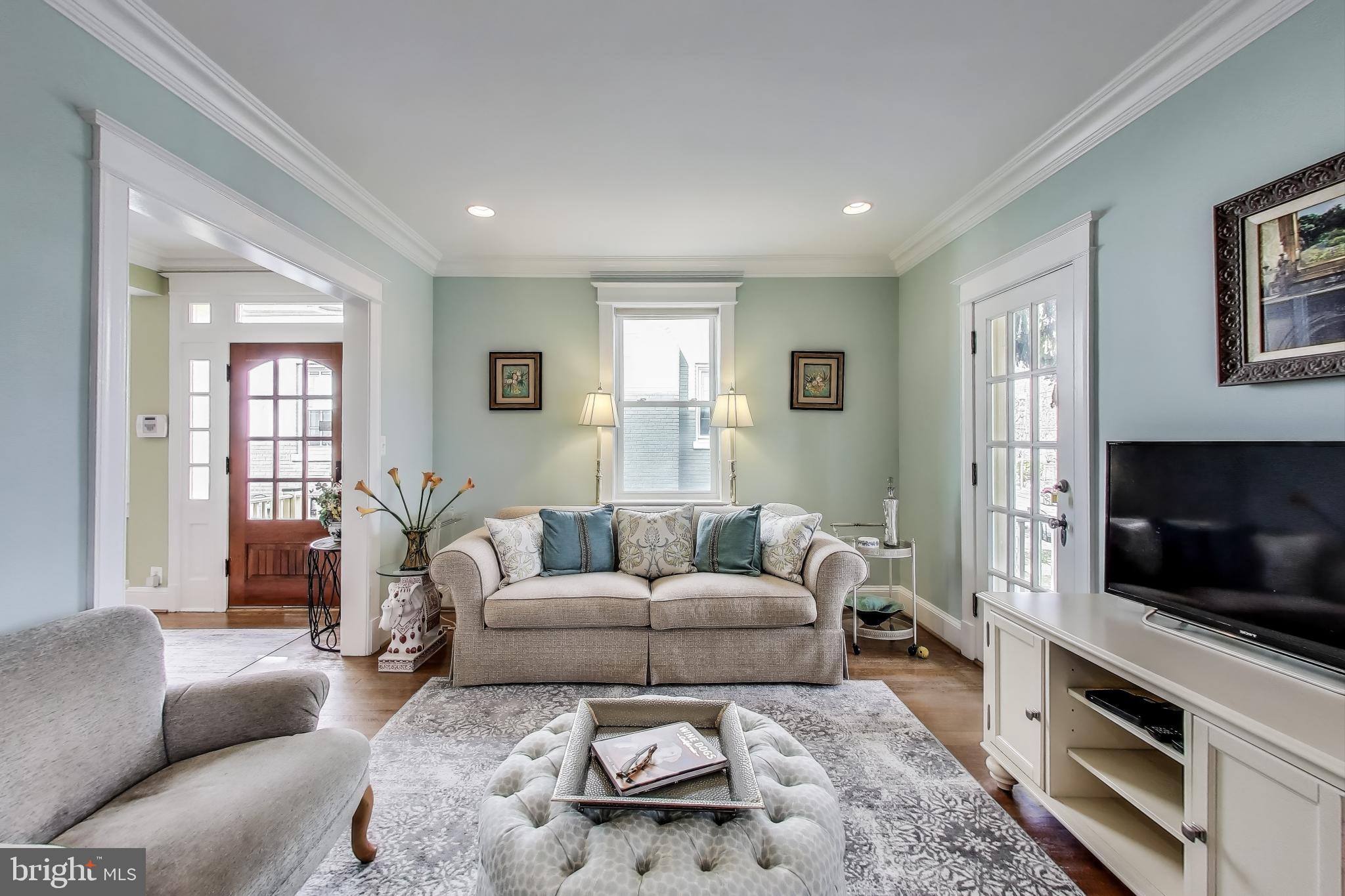 5708 4th Street Northwest Washington, DC 20011 - Photo 8 of 53 a living room with furniture and a flat screen tv