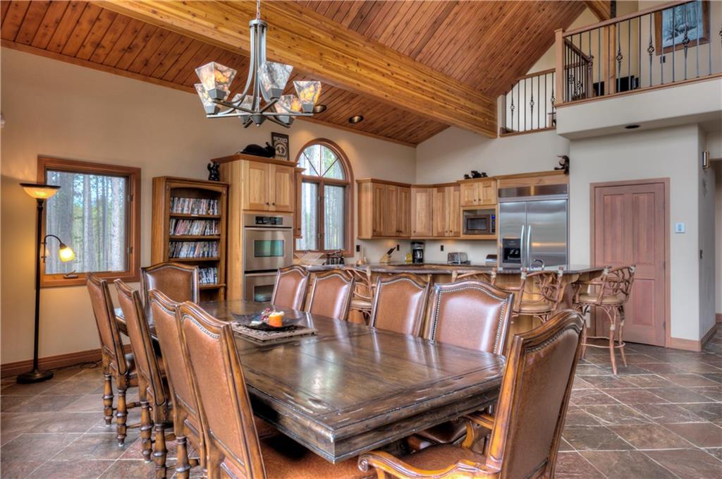 324 4 O'Clock Run Road Breckenridge, CO 80424 - Photo 9 of 25 a view of a dining room with furniture window and wooden floor