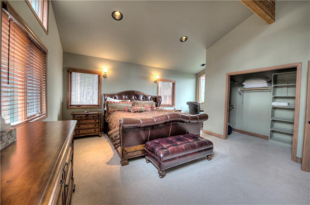 324 4 O'Clock Run Road Breckenridge, CO 80424 - Photo 10 of 25 a bedroom with furniture and a large window
