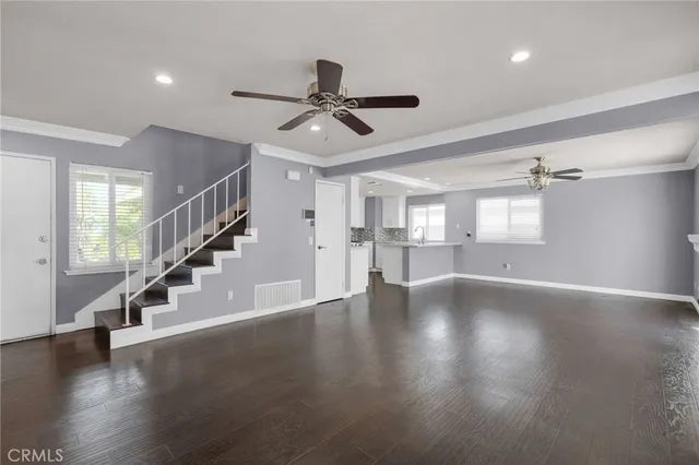 a view of an entryway with wooden floor