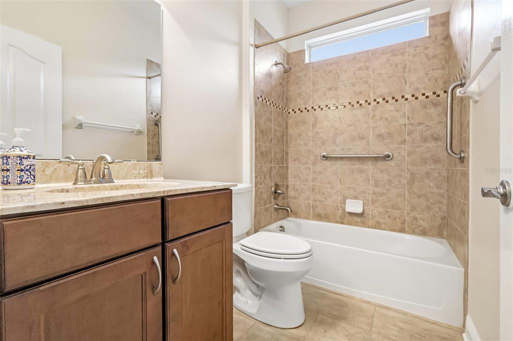 3522 Arlington Ridge Boulevard Leesburg, FL 34748 - Photo 25 of 43 a bathroom with a sink toilet and shower