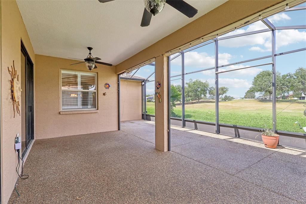3522 Arlington Ridge Boulevard Leesburg, FL 34748 - Photo 29 of 43 a view of a porch with furniture and floor to ceiling window