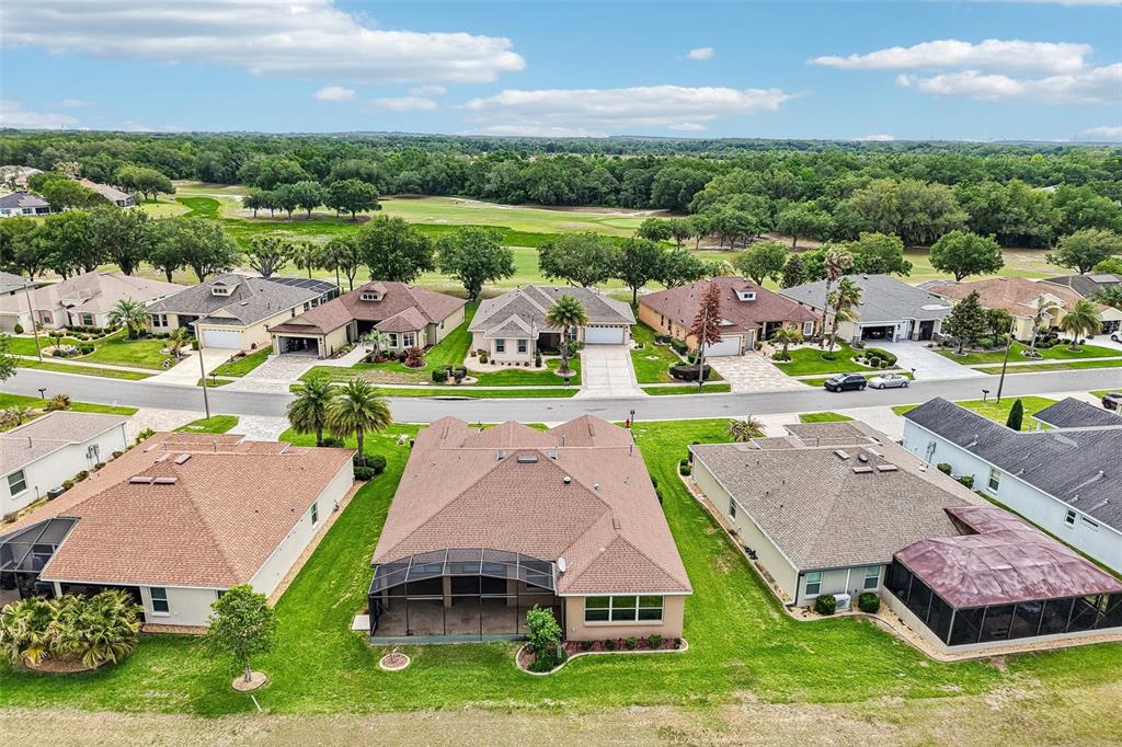 3522 Arlington Ridge Boulevard Leesburg, FL 34748 - Photo 33 of 43 an aerial view of a house with a garden and lake view