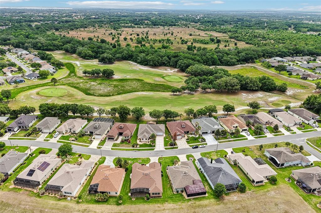 3522 Arlington Ridge Boulevard Leesburg, FL 34748 - Photo 35 of 43 an aerial view of residential houses with outdoor space