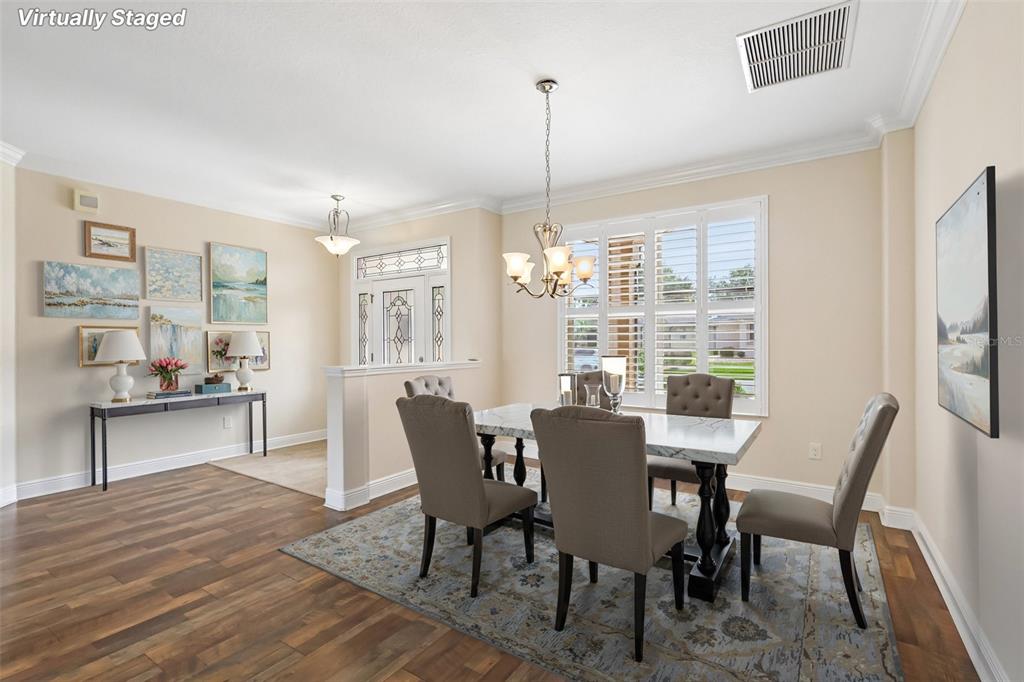 3522 Arlington Ridge Boulevard Leesburg, FL 34748 - Photo 5 of 43 a view of a dining room with furniture window and wooden floor