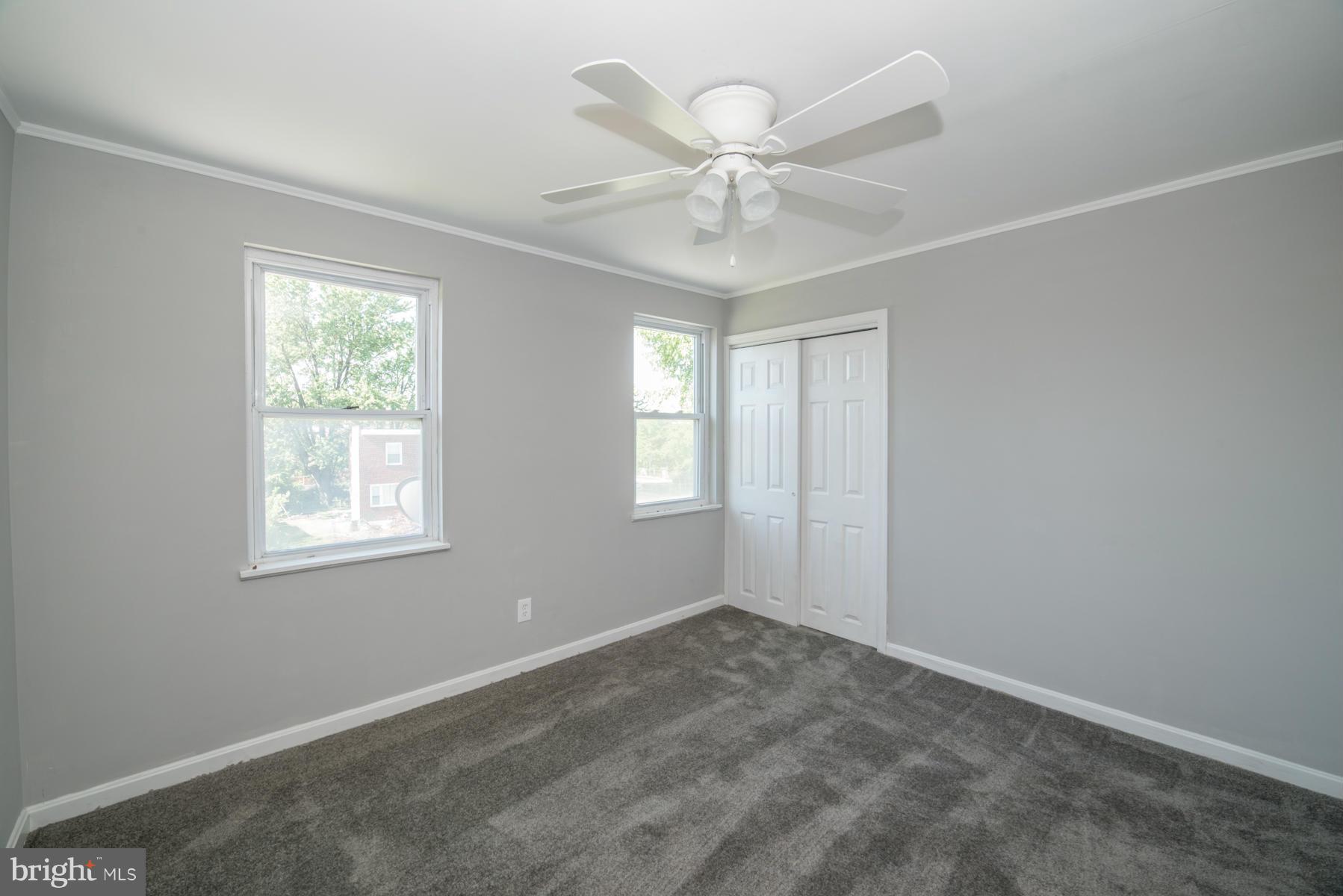 7404 Kirtley Road Baltimore, MD 21222 - Photo 10 of 13 a view of an empty room with a window