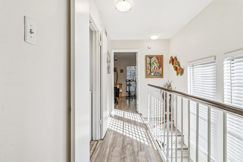15151 Berry Trail, Unit 1307 Dallas, TX 75248 - Photo 15 of 27 Hall featuring light wood-style floors