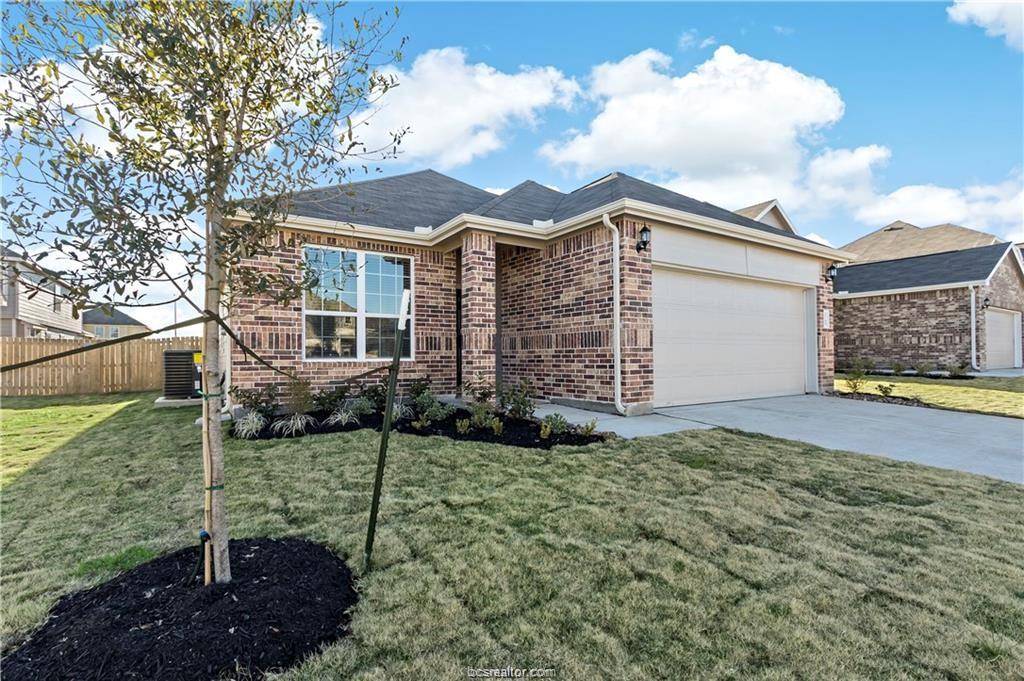 5769 Paseo Place Bryan, TX 77807 - Photo 1 of 1 a view of a house with a yard