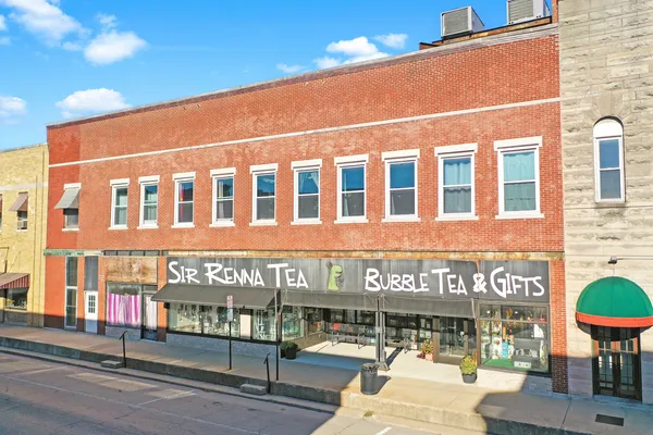 a building on the corner of street