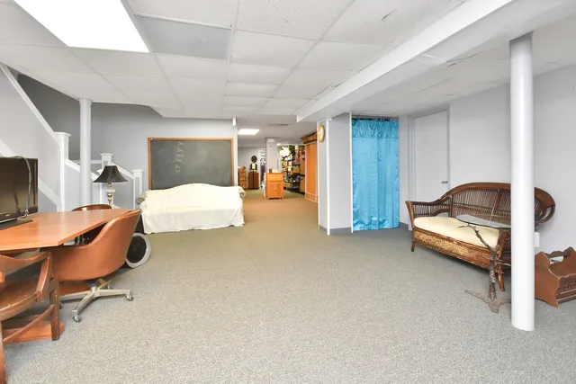 a very nice looking room with lots of gym equipment