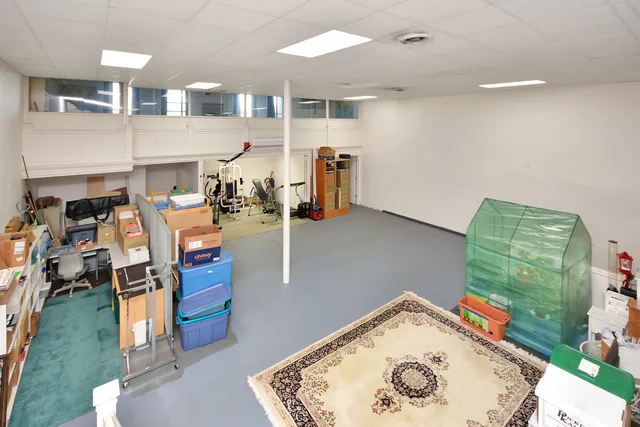 a bathroom with a sink toilet and mirror