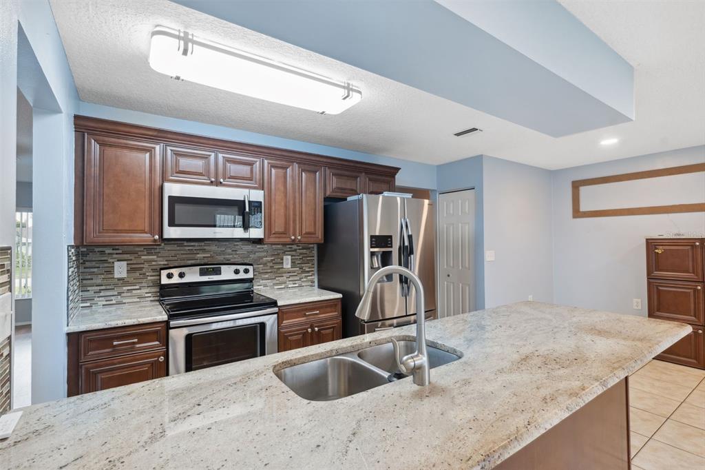 8215 Lora Del Rio Drive Port Richey, FL 34668 - Photo 11 of 35 Gallery Image 11