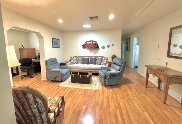 a view of a livingroom with furniture