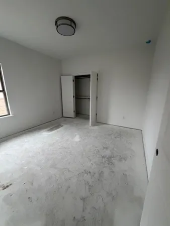 an empty room with a window