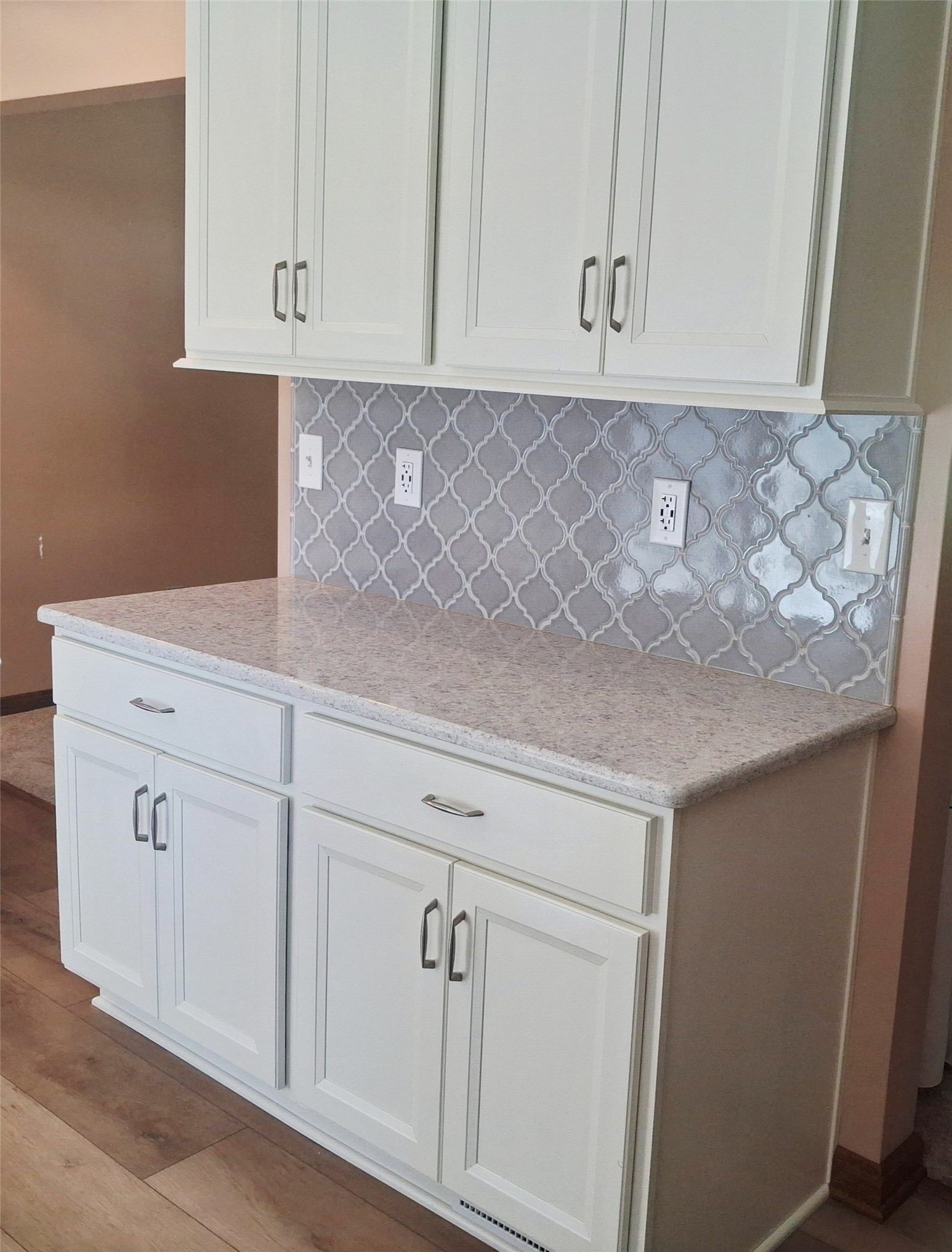 3918 Winchester Road Erie, PA 16506 - Photo 22 of 49 ON THE OTHER SIDE OF THESE CUPBOARDS IS THE HUGE LIVING ROOM