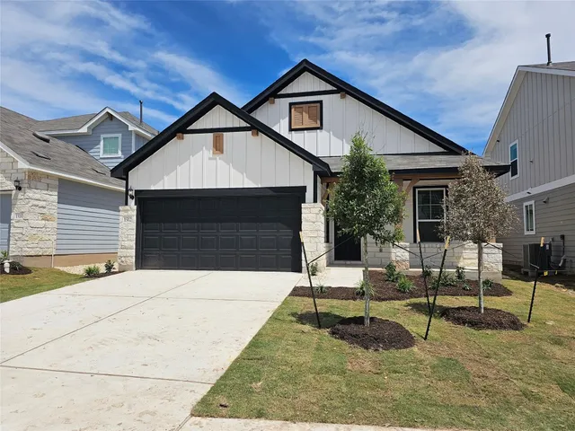 a front view of a house with entertaining space