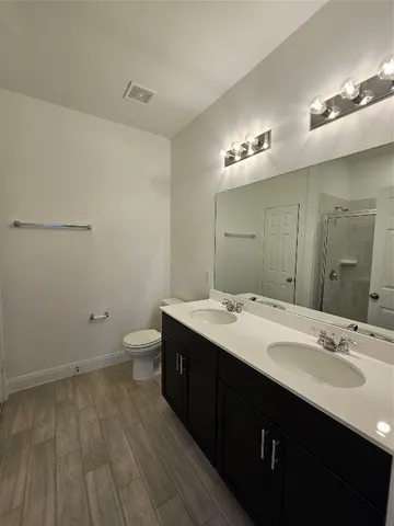 a bathroom with a sink and mirror