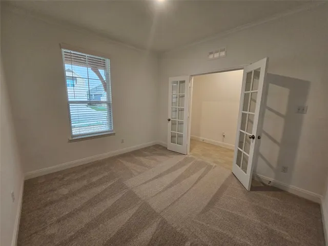 an empty room with windows