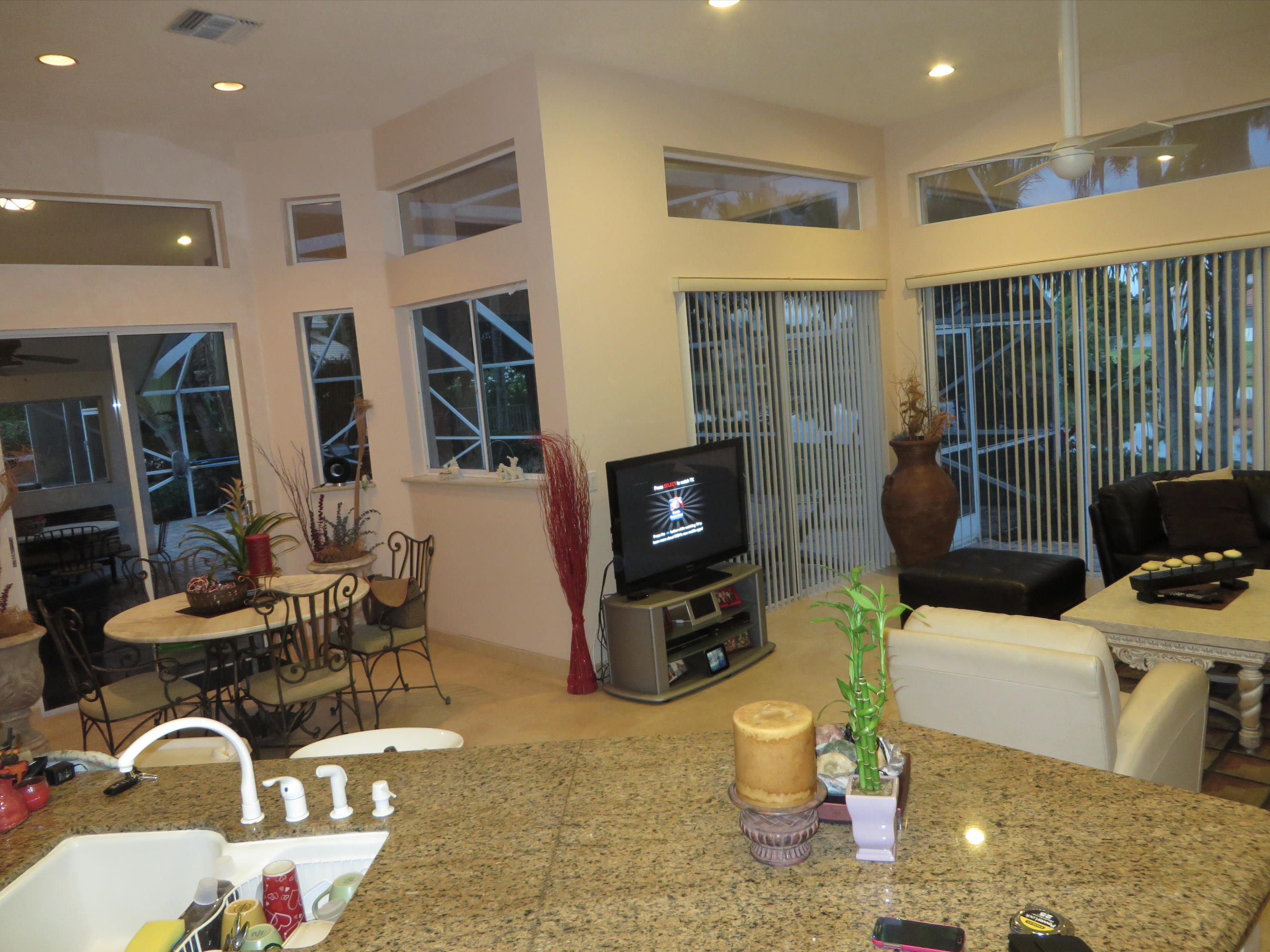 10787 Santa Rosa Drive Boca Raton, FL 33498 - Photo 19 of 48 Dinette & Family Room View from Kitchen