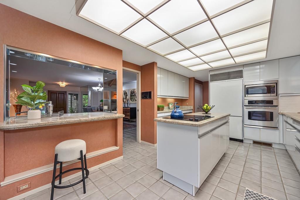 7650 Pineridge Road Fair Oaks, CA 95628 - Photo 17 of 67 a kitchen with stainless steel appliances granite countertop a stove and a refrigerator