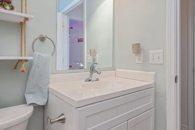 a bathroom with a sink and a toilet