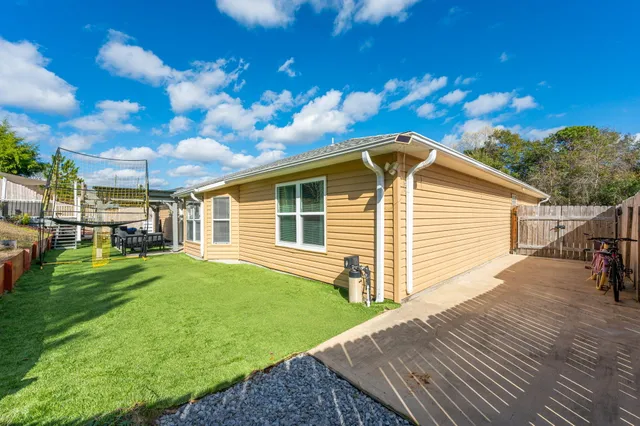 a view of a backyard with a garden