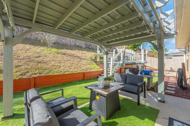 a outdoor living space with furniture