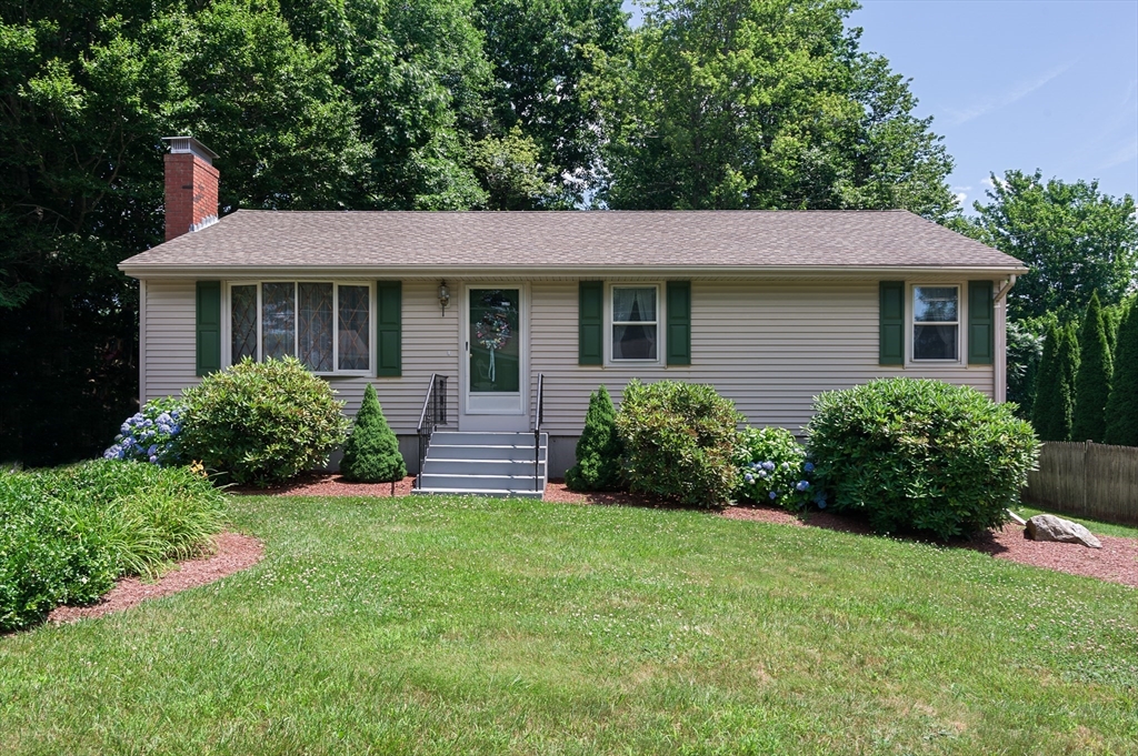 35 Juniper Lane Rutland, MA 01543 - Photo 1 of 15 a view of a house with garden and yard
