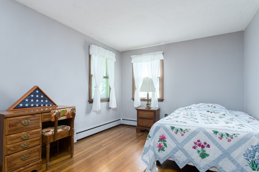 35 Juniper Lane Rutland, MA 01543 - Photo 11 of 15 a bedroom with a bed and a window