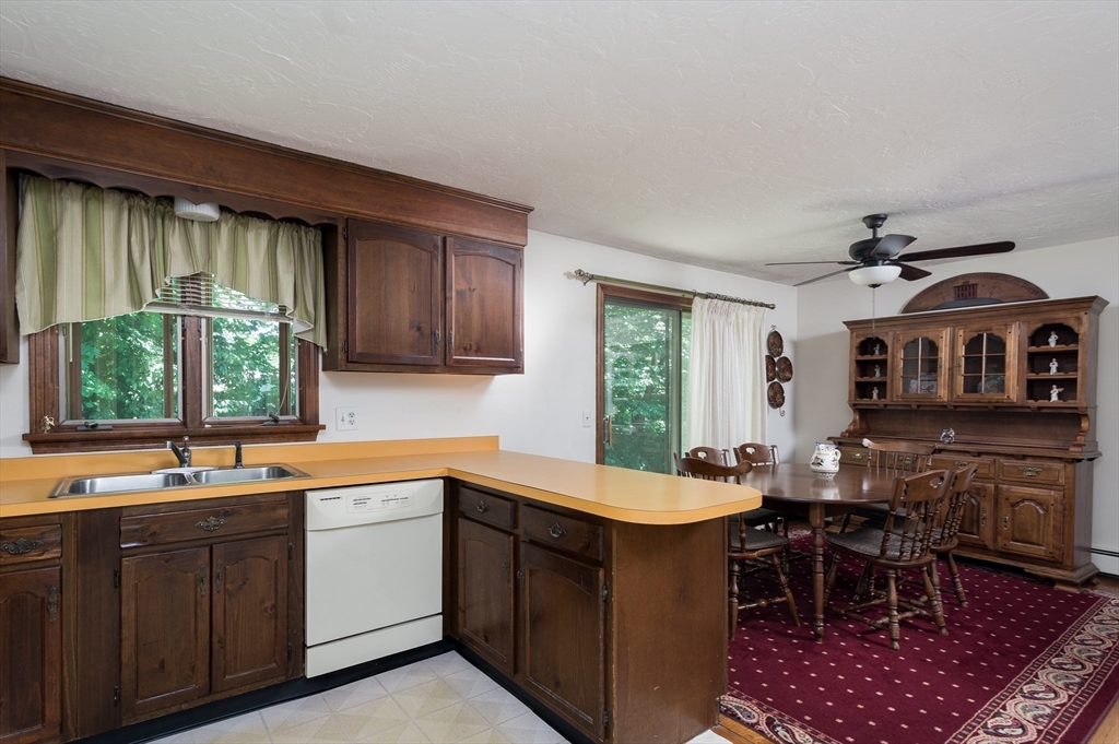 35 Juniper Lane Rutland, MA 01543 - Photo 3 of 15 a kitchen with a sink table and chairs