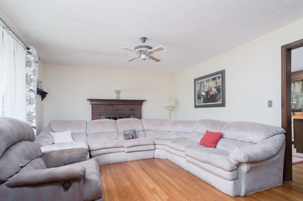 35 Juniper Lane Rutland, MA 01543 - Photo 6 of 15 a living room with furniture and a chandelier
